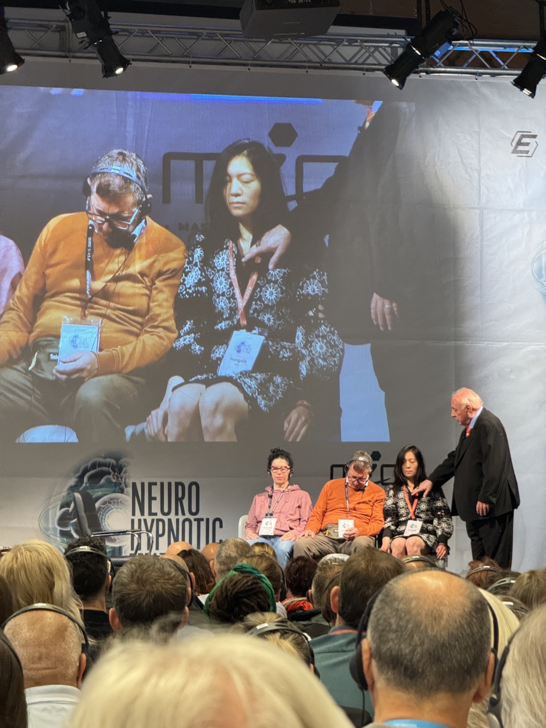 Ginny Wan on stage at a neuro-hypnotic masterclass