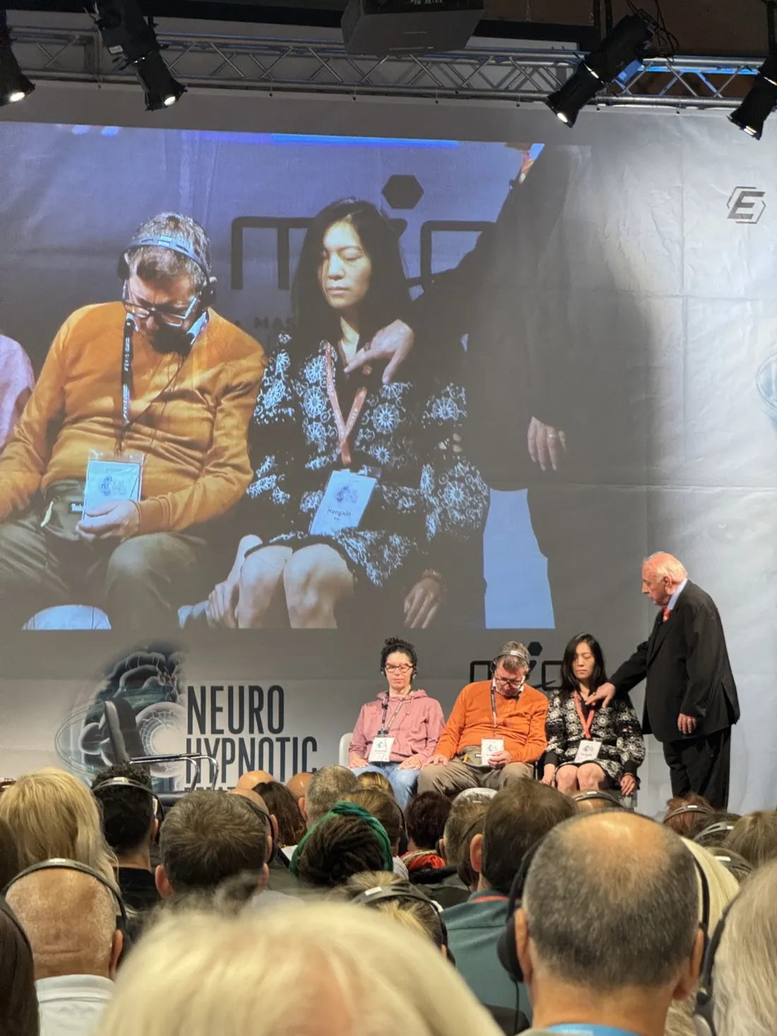 Ginny Wan on stage at a neuro-hypnotic masterclass